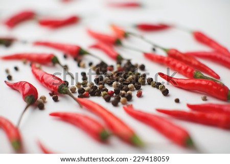 Colored Peppers Mix with red chili pepper on a white background. Pepper spices