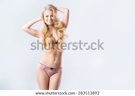 Portrait of a beautiful blonde with long hair. Natural emotions.