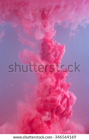 Ink swirling in water, cloud of ink in water. Abstract banner paints.
