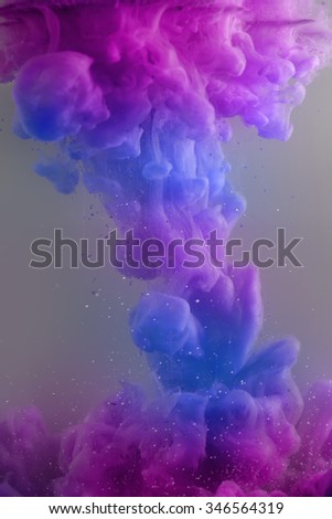 Ink swirling in water, cloud of ink in water. Abstract banner paints.