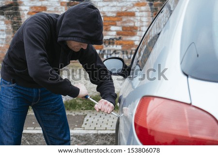 car thief in action