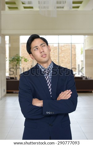 Disappointed Asian businessman