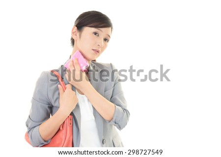 Woman wiping off the sweat