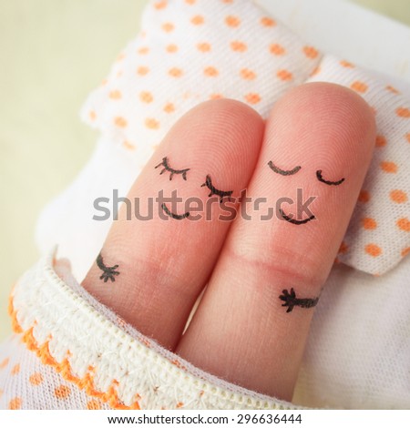 Finger art of a Happy couple. Couple asleep in bed.