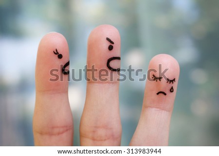 Finger art of family during quarrel. The concept of parents scolded her daughter, she was crying.