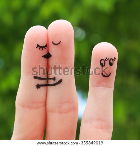 Finger art of a Happy couple. The happy couple kissing and hugging. The other girl looks at them and rejoices.