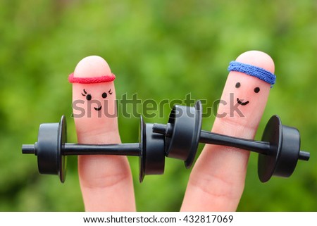 Finger art of a Happy couple. Concept of men and women in sports