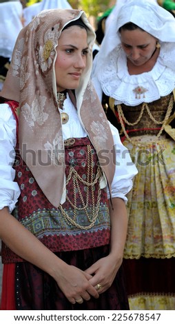 Jerzu, Sardinia - August 3, 2014: Parade of costumes and traditional masks of Sardinia at the Wine Festival August 3, 2014 in Jerzu, Sardinia.