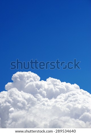 Picture of cumulonimbus clouds on a blue sky on a warm summer afternoon