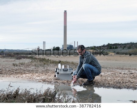 Collecting water samples for the analysis of its pollution near to an industrial complex