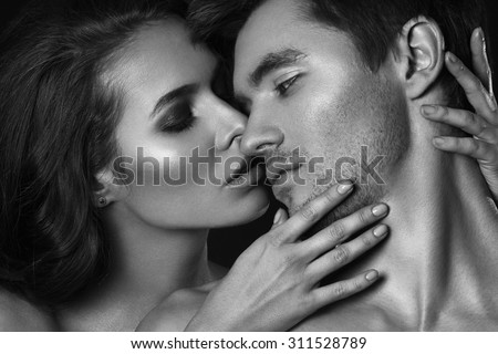 Sexy beauty couple.Kissing couple portrait.Sensual brunette woman in underwear with young lover, passionate couple foreplay closeup.Sexy couple in intimacy relations