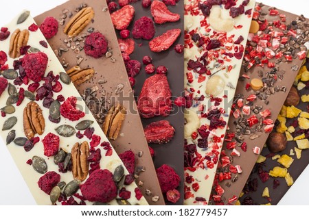 Handmade white, milk and dark chocolate bars with a variety of dried fruit and nut toppings