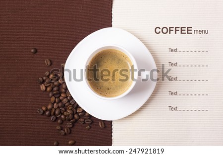 Black coffee in white cup with beans.Coffee menu background for text
