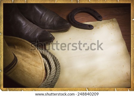 cowboy background with western hat and lasso and paper for text