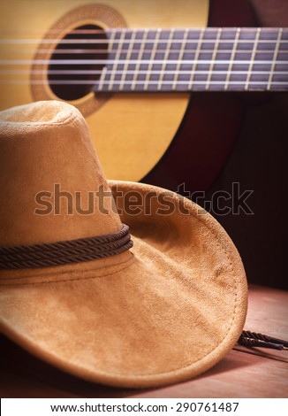 American Country music picture with cowboy hat and guitar
