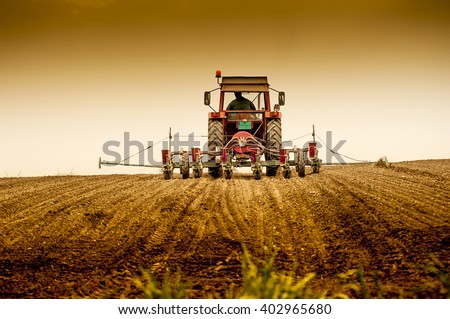 Planting soybean on field