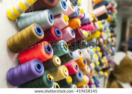 Reels of threads in tailor shop