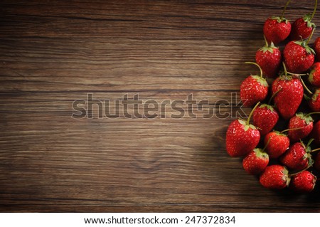 Strawberry on Wooden texture for background