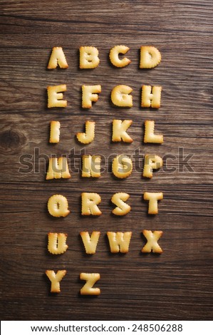 Cookies ABC in the form of alphabet A-Z on old wood background, Valentines day