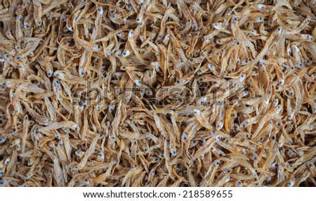 Dried small fish background on the market