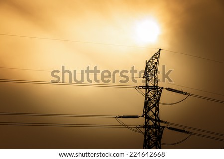 High voltage electric line with the sun