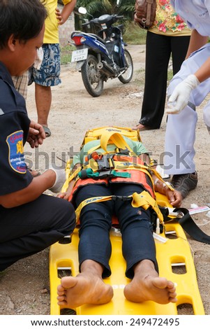 Chumpon, Thailand January 3 :Woman who accident by car was rescue by doctor and rescue on site of accident. Thailand on January 3, 2015