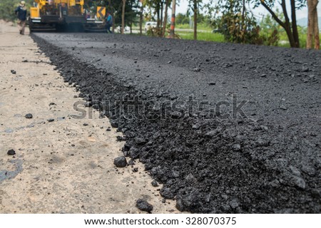 Close-up road under construction.