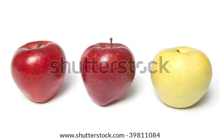 Be different - three red and yellow apples in a row