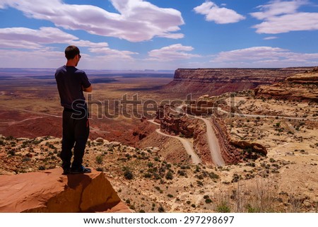 man overlooking canyon in US southwest