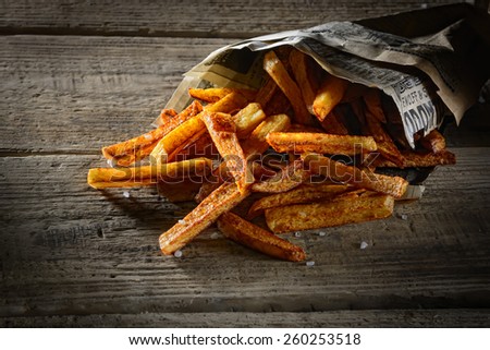 French fries on a wooden surface