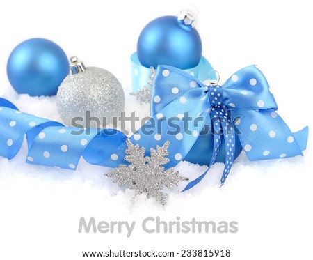 Blue and silvery Christmas balls on a white background.