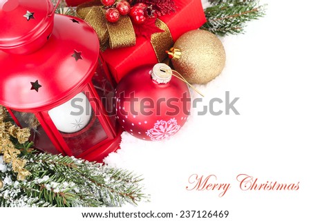 Christmas background with a red lamp and golden Christmas balls.