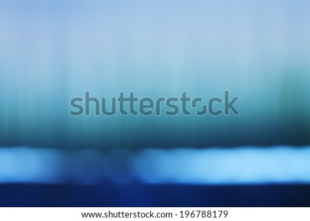 Abstract background of colored stained blurred bands.