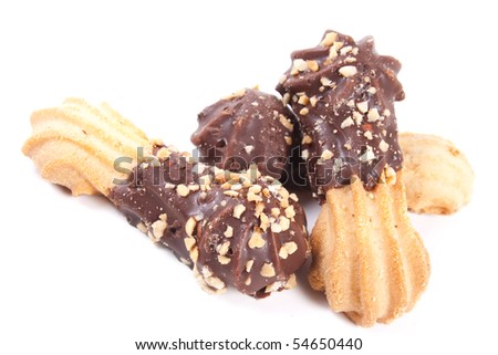 Cookie covered a chocolate and nuts on a white background