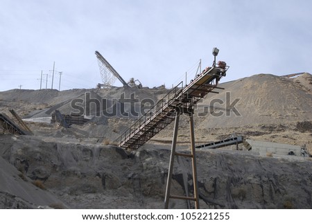 Conveyor belt for crushed stone at a roadstone quarry, Nevada, USA