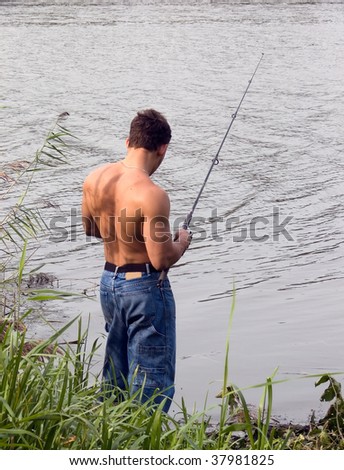 Fishing.  Fisherman. Cost(stand)s not riverside.