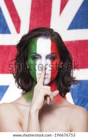 Beautiful italian supporter with finger on her lips during Italy VS England