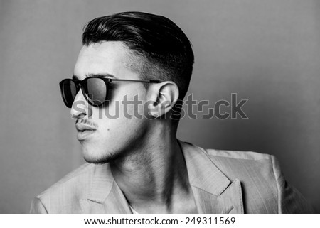 Man wearing sunglasses profile black and white
