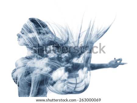 Double exposure of happy girl dancing and cloudscape