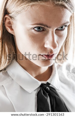 Beautiful woman closeup portrait wearing blouse