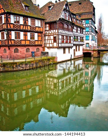 STRASBOURG, FRANCE - MARCH 19: Cafes in Petite-France on March 19, 2013 in Strasbourg. Petite-France is an historic area in the center of Strasbourg.