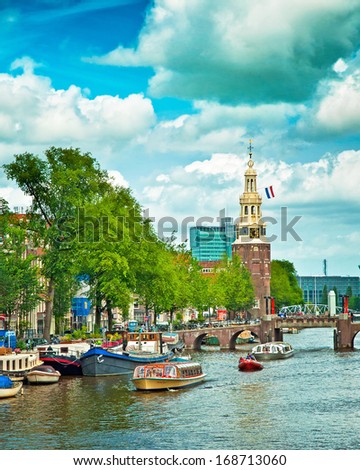 AMSTERDAM THE NETHERLANDS 29 JUNE Canals of Amsterdam on 29 June 2013 Amsterdam is the capital and most populous city of the Netherlands AMSTERDAM THE NETHERLANDS 29 JUNE Canals of Amsterdam on 29 June 2013 Amsterdam is the capital and most populous city of the Netherlands
