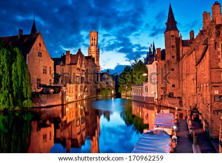 BRUGES, BELGIUM - APRIL 20: Houses along the canals of Brugge or Bruges in the evening, Belgium on April 20, 2012. Bruges is frequently referred to as \