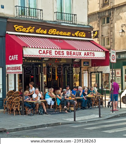 PARIS, FRANCE - 07 SEPTEMBER, 2014: Typical bar in the old town of Paris, France on 7 September 2014. . Paris is one of the most populated metropolitan areas in Europe full of bars and cafes.