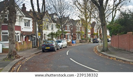 LONDON, UNITED KINGDOM - 11 DECEMBER, 2014: Typical row of houses with terrace in London, United Kingdom on 11 December 2014.