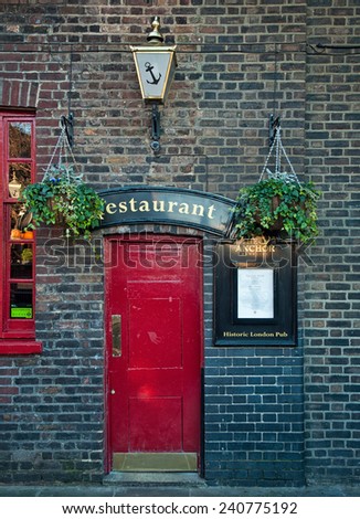LONDON, UNITED KINGDOM - 13 DECEMBER, 2014: Typical British pub in London, United Kingdom on 13 December, 2014. Pub business in the UK has been declining every year.