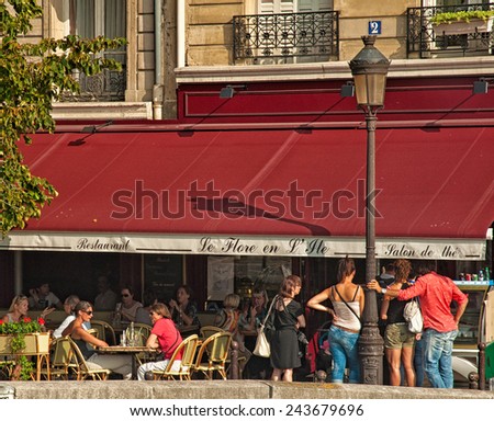 PARIS, FRANCE - 07 SEPTEMBER, 2014: Typical bar in the old town of Paris, France on 7 September 2014. Paris is one of the most populated metropolitan areas in Europe full of bars and cafes.