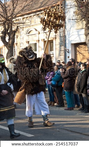 MOHACS, HUNGARY - FEBRUARY 15, 2015: Unidentified people in mask participants at the Mohacsi Busojaras, a carnival for spring greetings on February 15, 2015 in Mohacs, Hungary.