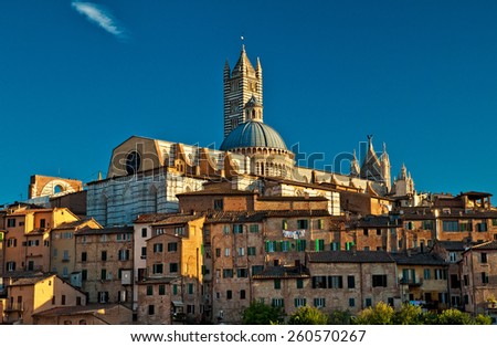 SIENA, ITALY - September 12: Nice houses in the old town of Siena, September 12, 2013 in Siena, Italy. The historic centre of Siena has been declared by UNESCO a World Heritage Site.