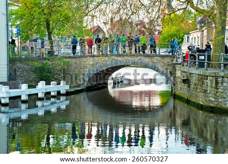 BRUGES, BELGIUM - APRIL 20: Houses along the canals of Brugge or Bruges, Belgium on April 20, 2012. Bruges is frequently referred to as \